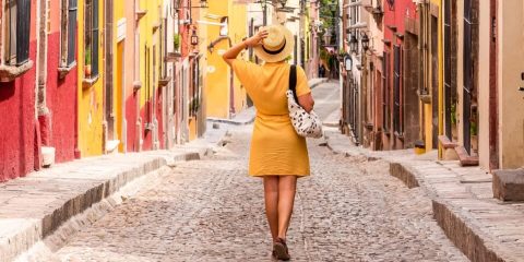 Woman walking the streets in San Miguel de Allended. Cheap Mexican Insurance