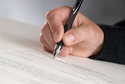 a person holding a document
