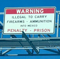 warning sign - illegal to cary weapons