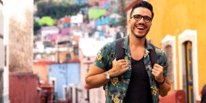 Young tourist man walking the streets of Guanajuato Mexico. Cheap Mexican Insurance